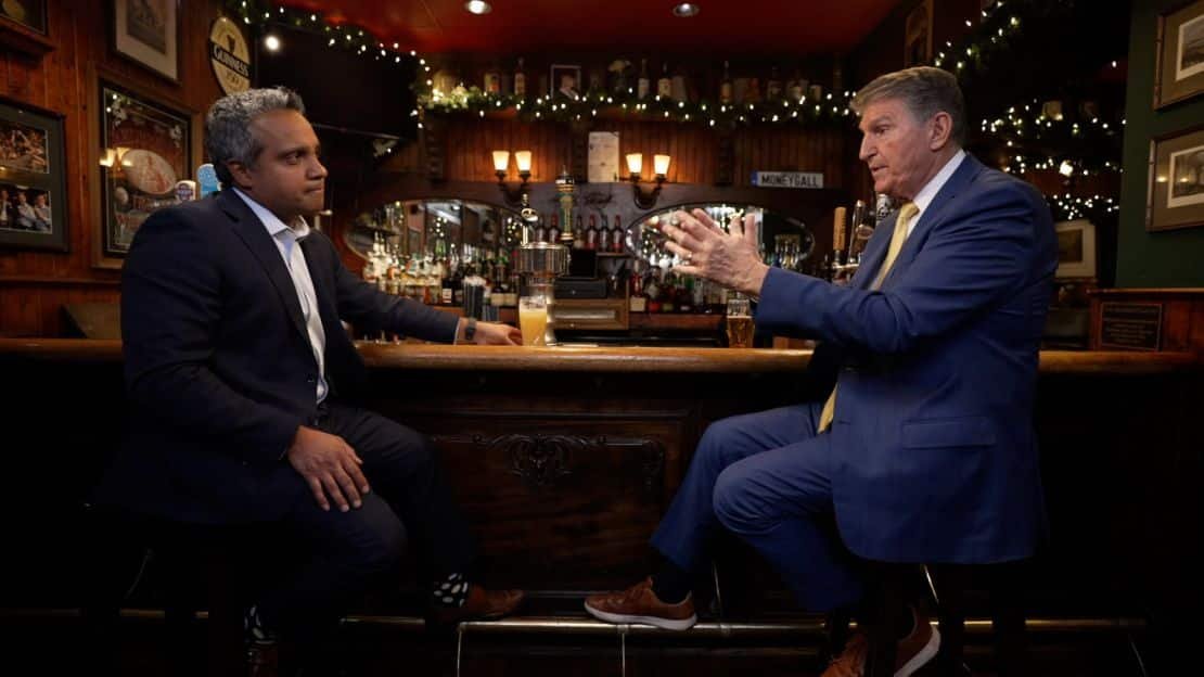 Sen. Joe Manchin is interviewed by Manu Raju at the Dubliner in Washington, DC, on December 19, 2024.