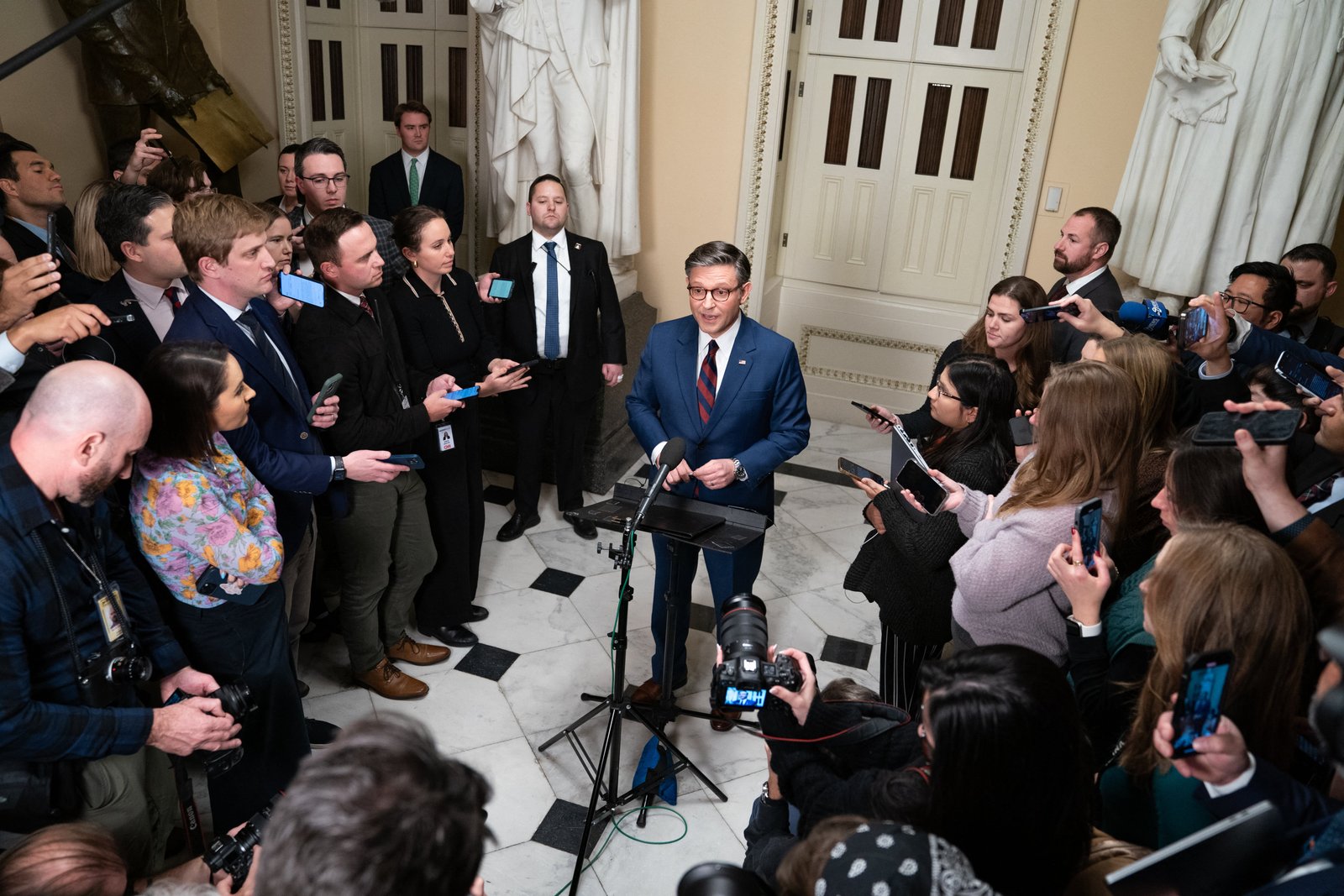 Speaker of the House Mike Johnson, Republican from Louisiana, speaks to the media during a vote on a revised continuing resolution bill at Capitol Hill in Washington, DC on December 19, 2024. He’s now scrambling to find a deal to fund the government