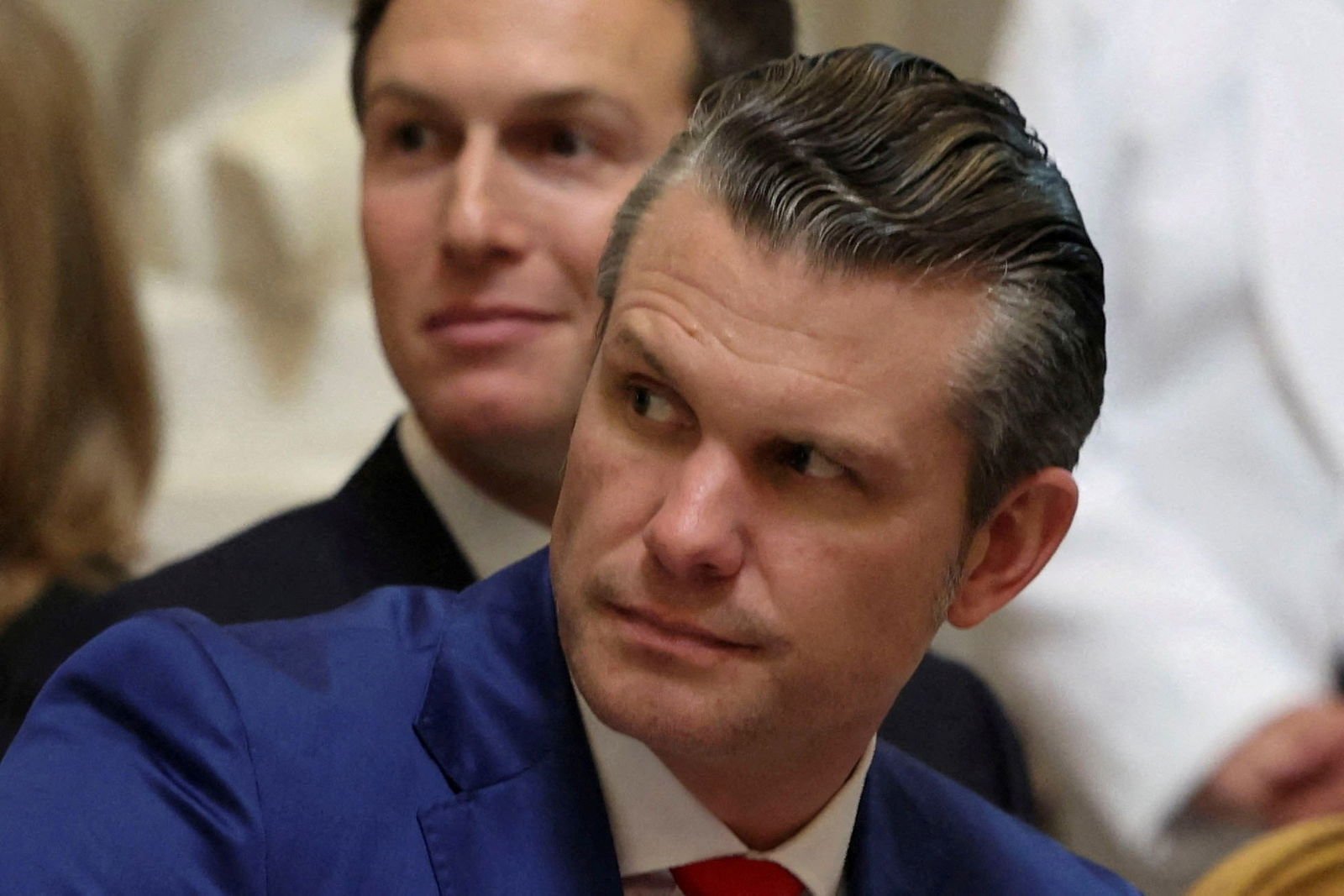Pete Hegseth looking to the right.