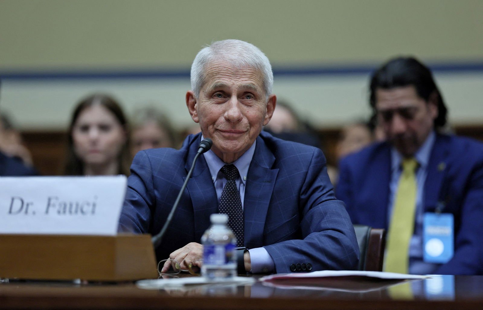Anthony Fauci at a microphoned desk.