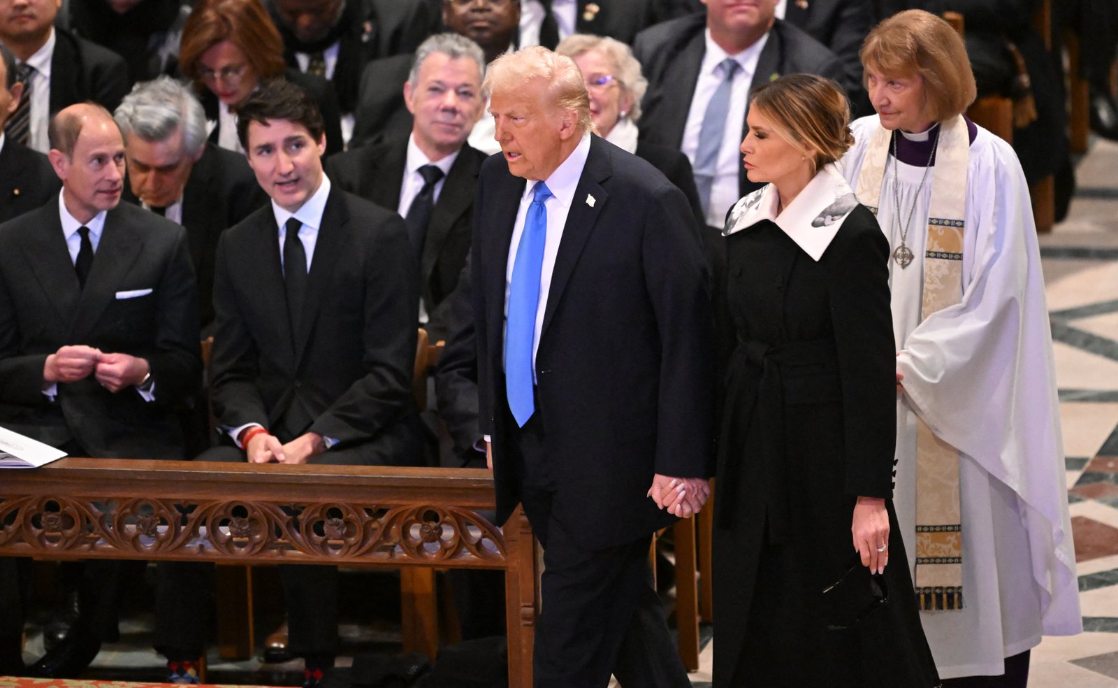 Donald and Melania take their seats