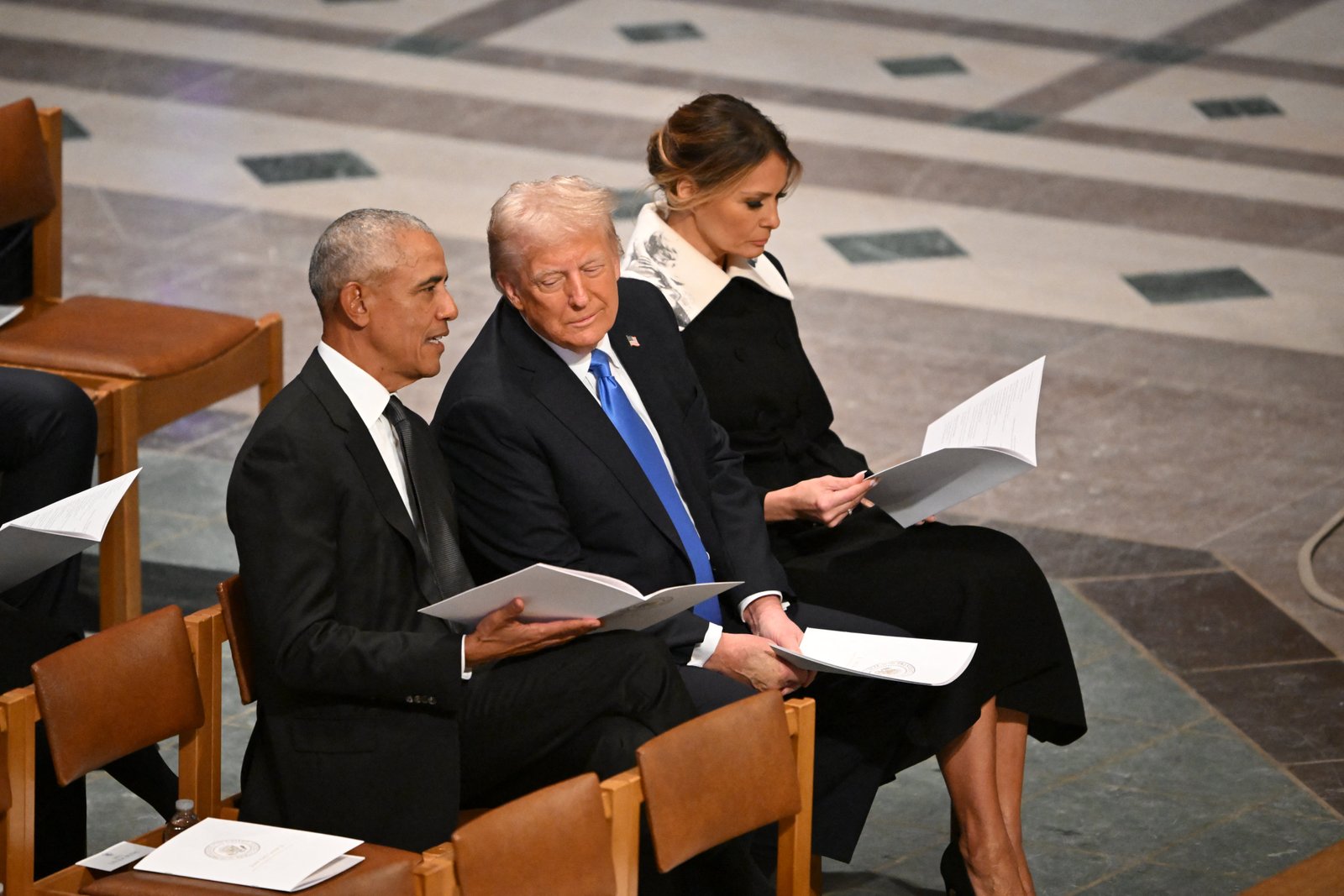 The 44th and 45th president’s share a quiet word